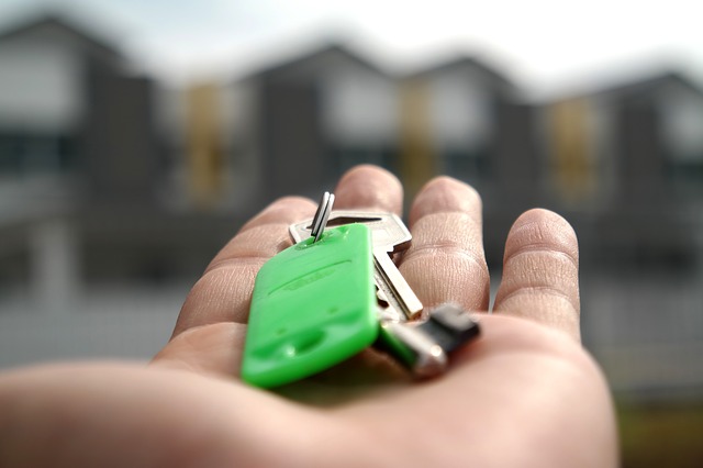 a closeup of a set of keys in a hand